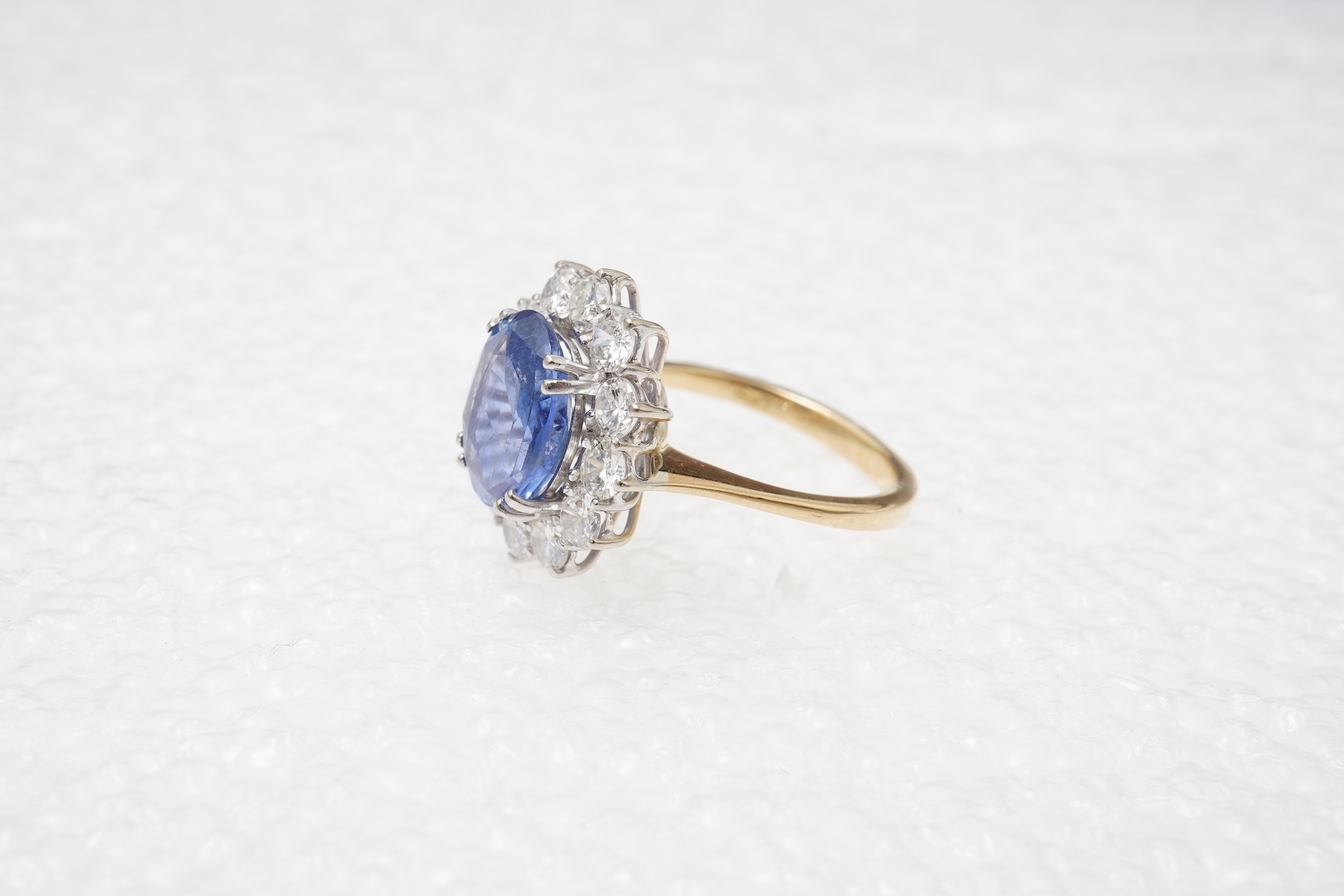 A sapphire and diamond cluster ring